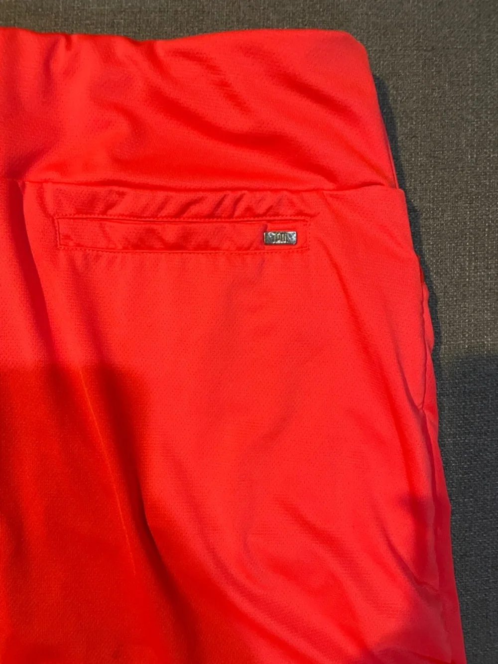 Tail White Label Neon Orange Side Micro Pleat Athletic Golf Skort